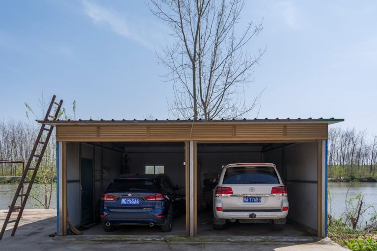 two cars in two garages